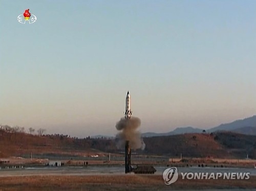 This photo, captured from footage released by North Korea's state-run broadcaster on Feb. 13, 2017, shows the country's latest launch of a new intermediate-range ballistic missile. (Yonhap)