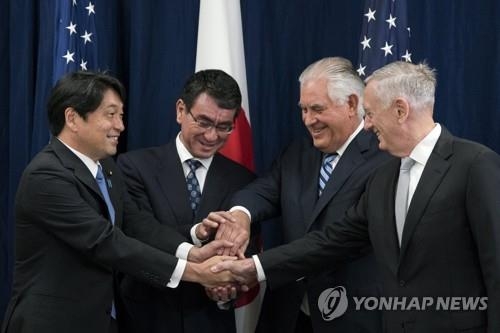 This EPA photo shows, from R to L, U.S. Defense Secretary Jim Mattis, Secretary of State Rex Tillerson, Japanese Foreign Minister Taro Kono and Defense Minister Itsunori Onodera at "2+2" talks at the Department of State in Washington on Aug. 17, 2017. (Yonhap) 