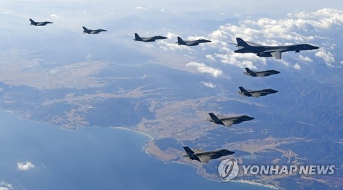 A B-1B Lancer bomber of the U.S. Air Force flies over Korea in formation with the allies' fighter jets on Dec. 6, 2017, in this photo provided by South Korea's Air Force. (Yonhap)