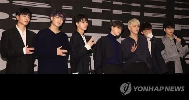 The members of iKON pose for photos during a press conference for the release of the group's new album, "New Kids: The Final," on Oct. 1, 2018. (Yonhap)