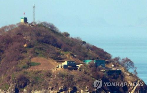 This photo provided by the Joint Press Corps shows North Korea's Hambak Island near the Northern Limit Line, the de facto inter-Korean maritime border, in the Yellow Sea and was taken from South Korea's Mal Island in Ganghwa County, Incheon, on Sept. 24, 2019. North Korea set up several facilities on the island for surveillance, but despite some media speculation, there are apparently no weapons on the island, according to South Korea's defense ministry. (PHOTO NOT FOR SALE) (Yonhap)
