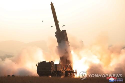 A projectile mounted on a super-large multiple rocket launcher is launched from North Korea's western region toward the East Sea on Oct. 31, 2019, in this photo released by the North's official Korean Central News Agency (KCNA) the next day. According to the KCNA, the North successfully tested a super-large multiple rocket launcher, verifying the "perfection" of the weapons system. (For Use Only in the Republic of Korea. No Redistribution) (Yonhap)