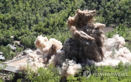 The Tunnel No. 4 at North Korea's only known nuclear test site Punggye-ri is blown up on May 24, 2018, during the dismantlement of the site, in this press pool photo. The site was demolished in a series of explosions over several hours on the day, with press members from South Korea, China, Russia, the United States and Britain covering the process carried out in Kilju County of North Hamgyong Province in the country's northeast. (Yonhap)