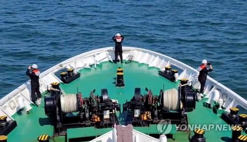 North Korea warns South’s navy over search for dead official