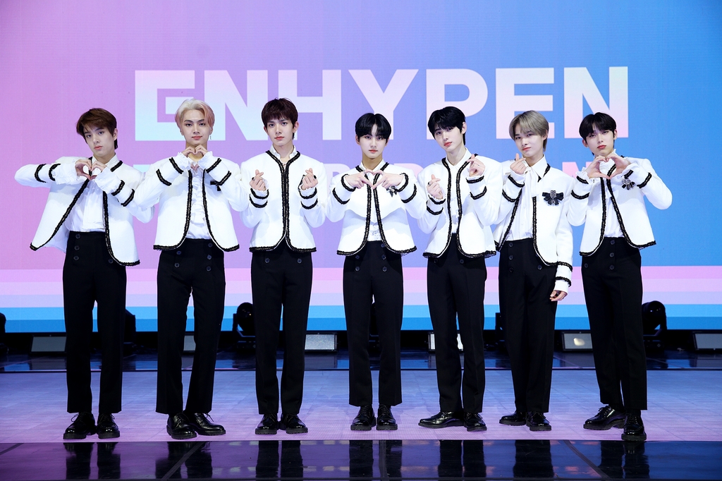 This photo, provided by Belift Lab, shows members of rookie boy band ENHYPEN posing for a photo during a media showcase held online on Nov. 30, 2020. (PHOTO NOT FOR SALE) (Yonhap)