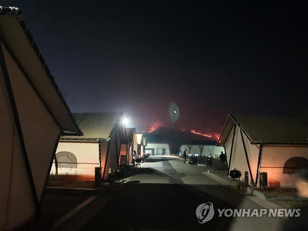 Residents take shelter at a camping site in Andong, North Gyeongsang Province, on Feb. 21, 2021. (Yonhap)