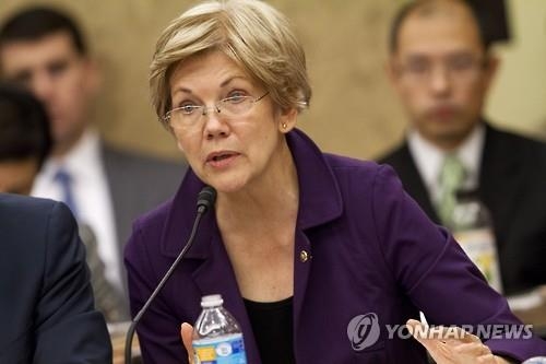 워런 "변덕심한 인종주의 불량배"…트럼프 공격 이어가 - 2