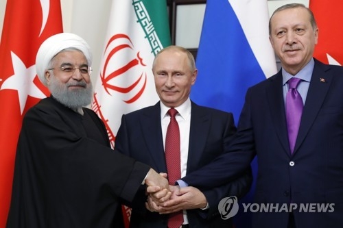 좌측부터 이란, 러시아, 터키 대통령[타스=연합뉴스자료사진]