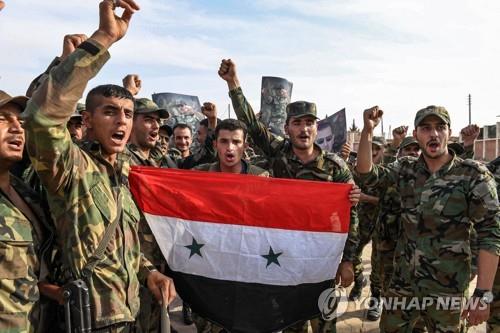 만비즈에 배치된 시리아 정부군