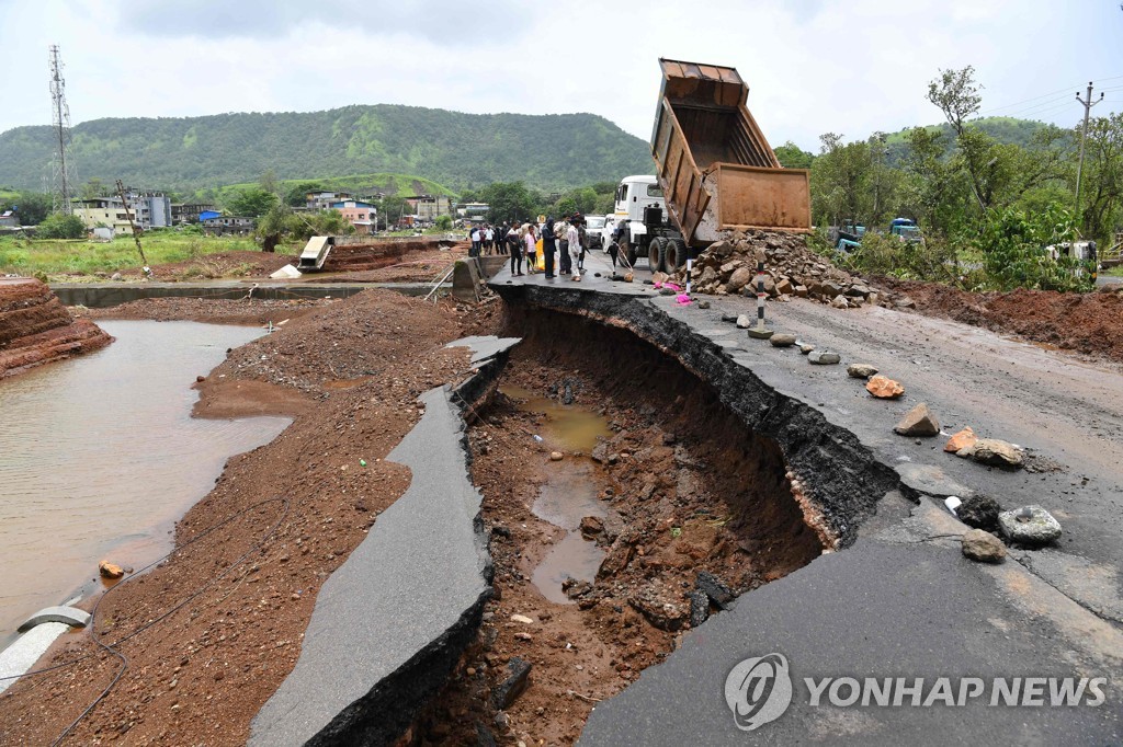 INDIA-WEATHER-LANDSLIDE-FLOOD-MONSOON