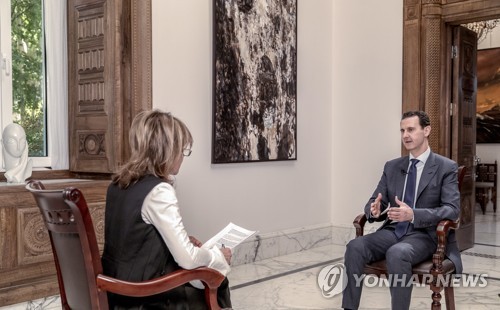 영국 언론과 인터뷰하는 아사드 시리아 대통령