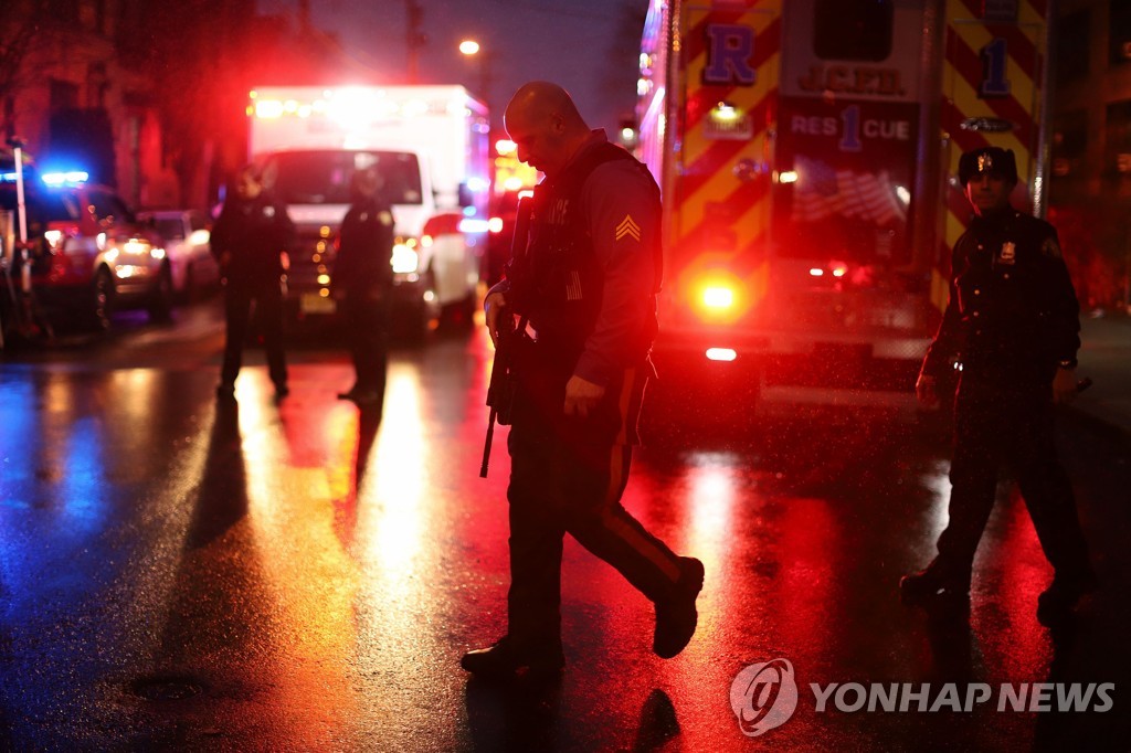 US-SHOOTOUT-AND-STANDOFF-WITH-TWO-GUNMAN-IN-JERSEY-CITY-LEAVES-M