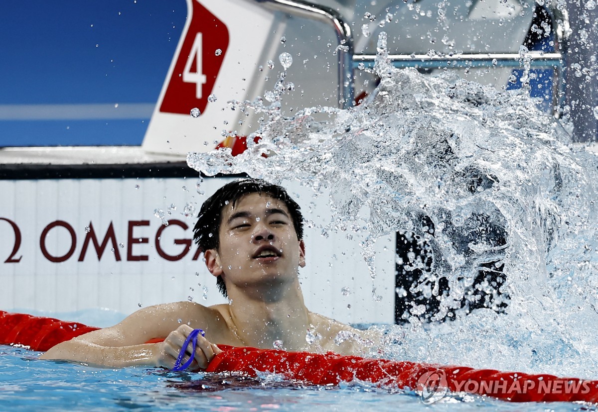 판잔러, 세계 신기록 세우며 자유형 100ｍ 우승