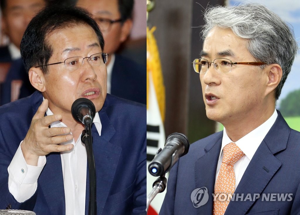 홍준표 경남 도지사(왼쪽)와 박종훈 경남교육감 <<연합뉴스 자료사진>>