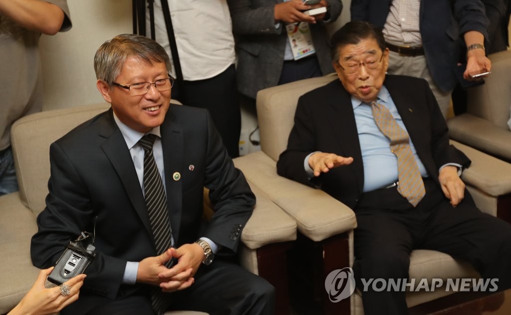 김운용 전 IOC 부위원장과 리용선 ITF 총재