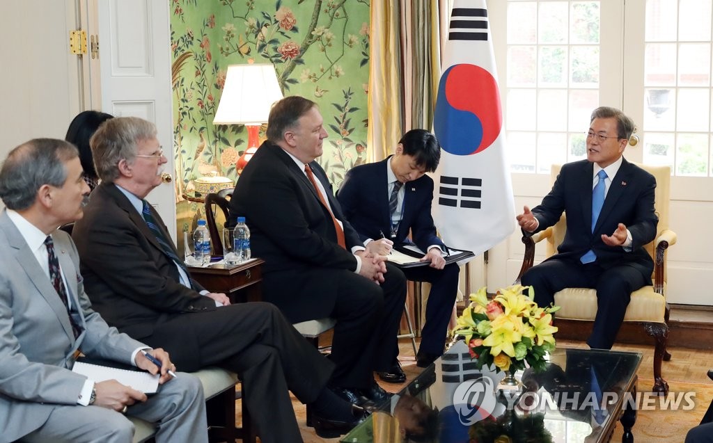 South Korean President Moon Jae-in (R) speaks in a meeting with U.S. Secretary of State Mike Pompeo (3rd from R) and National Security Adviser John Bolton (2nd from L) at the United States' state guest house, Blair House, on April 11, 2019. (Yonhap)