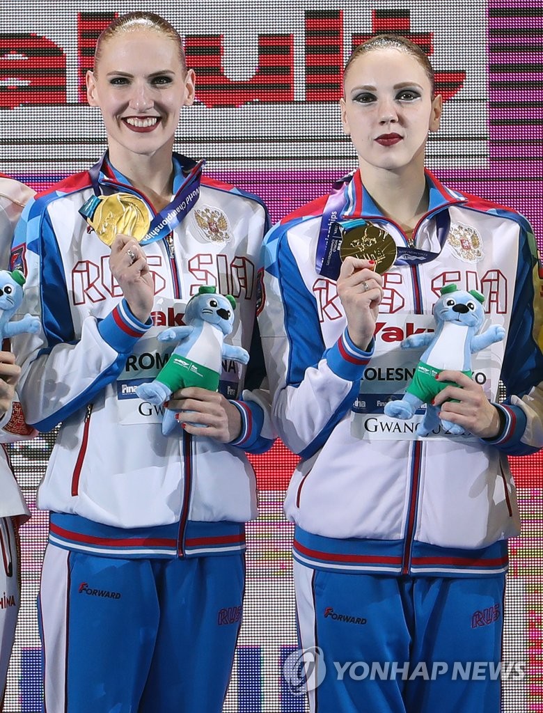 Russia takes gold in artistic swimming competition Russia takes gold in artistic swimming competition
