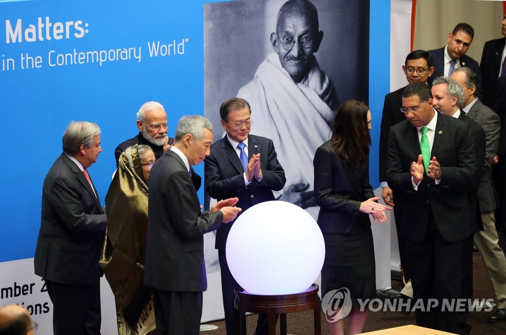 South Korean President Moon Jae-in (C) attends a ceremony at the U.N. Economic and Social Council conference room in New York on Sept. 24, 2019 to commemorate the 150th anniversary of Mahatma Gandhi's birth. (Yonhap)