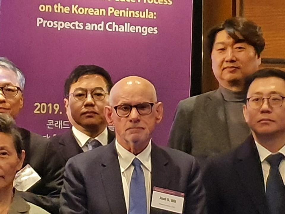 Joel Wit (C), a senior fellow at Washington-based think tank Stimson Center, poses for a photo during a conference in Seoul hosted by the state-run Korea Institute for National Unification on Nov. 6, 2019. (Yonhap)