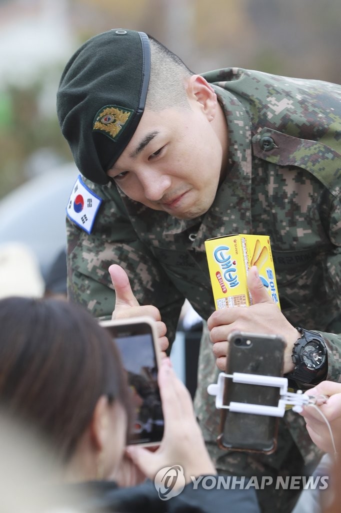 Taeyang discharged from military Taeyang discharged from military
