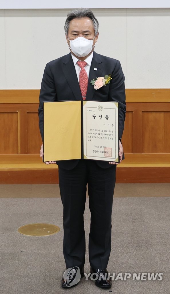 Re-elected head of S. Korean Olympic body Re-elected head of S. Korean Olympic body