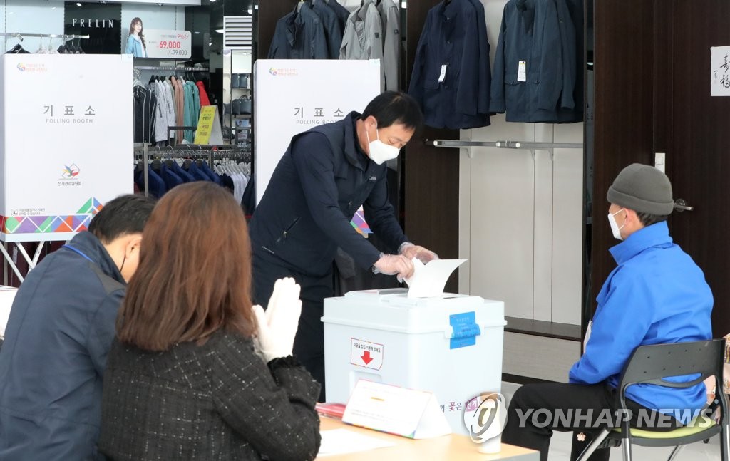 정장 가게서 '한표'