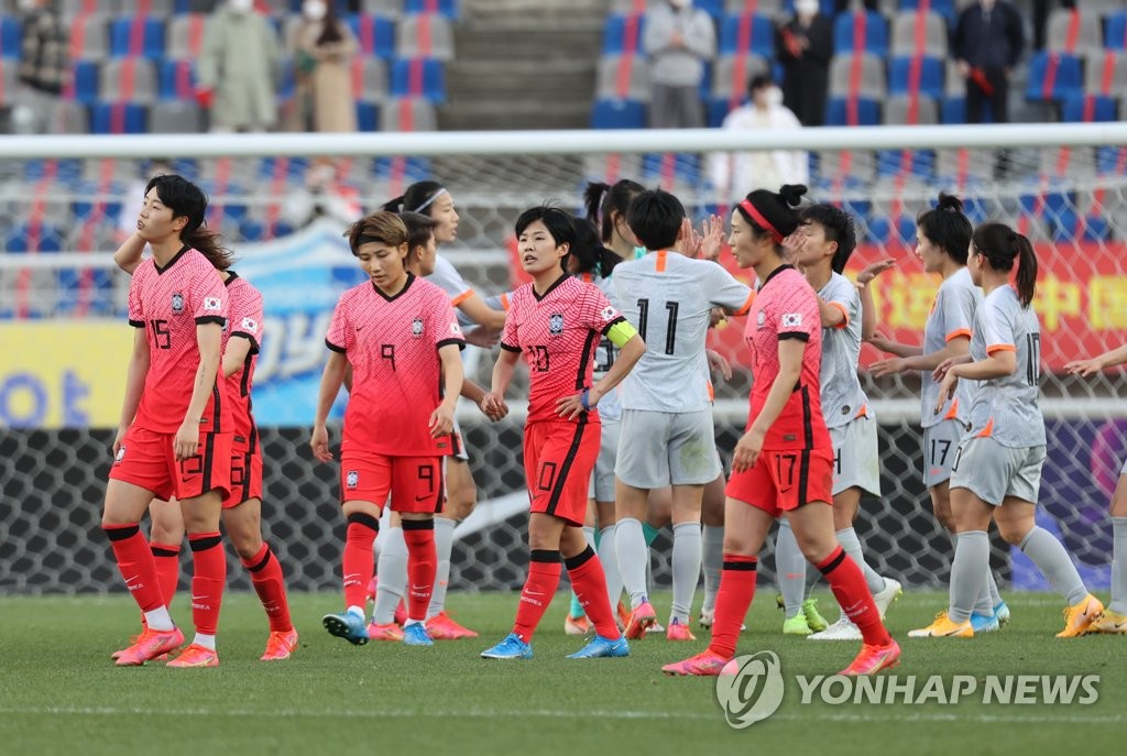 South Korean players react to their 2-1 loss to China in the teams' Olympic women's football qualifying match at Goyang Stadium in Goyang, Gyeonggi Province, on April 8, 2021. (Yonhap) 