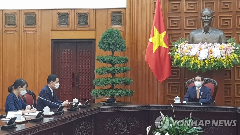El canciller surcoreano con el PM vietnamita El canciller surcoreano con el PM vietnamita