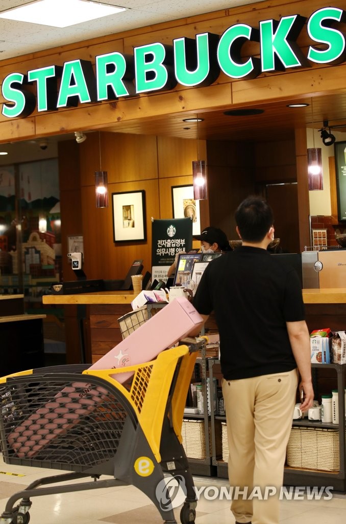 E-Mart decides to buy bigger stake in Starbucks Coffee Korea E-Mart decides to buy bigger stake in Starbucks Coffee Korea