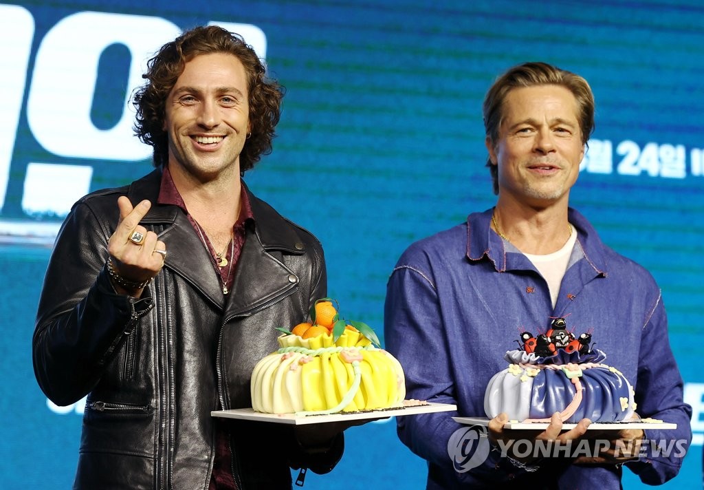 Brad Pitt et Aaron Taylor-Johnson à Séoul Brad Pitt et Aaron Taylor-Johnson à Séoul