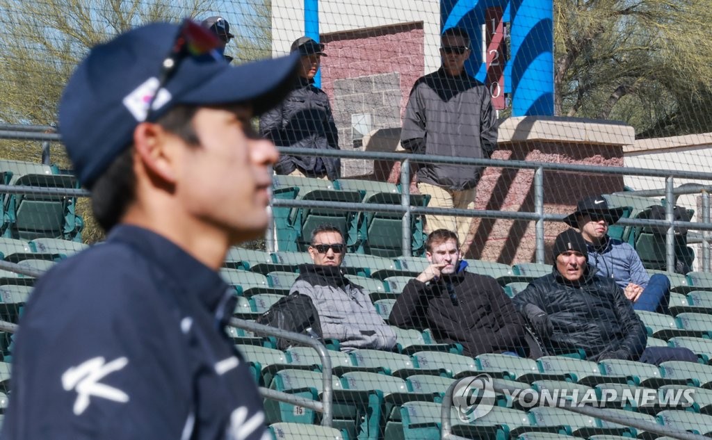 Major league scouts take in a scrimmage between South Korea and the NC Dinos ahead of the World Baseball Classic at Kino Veterans Memorial Stadium in Tucson, Arizona, on Feb. 16, 2023. (Yonhap)