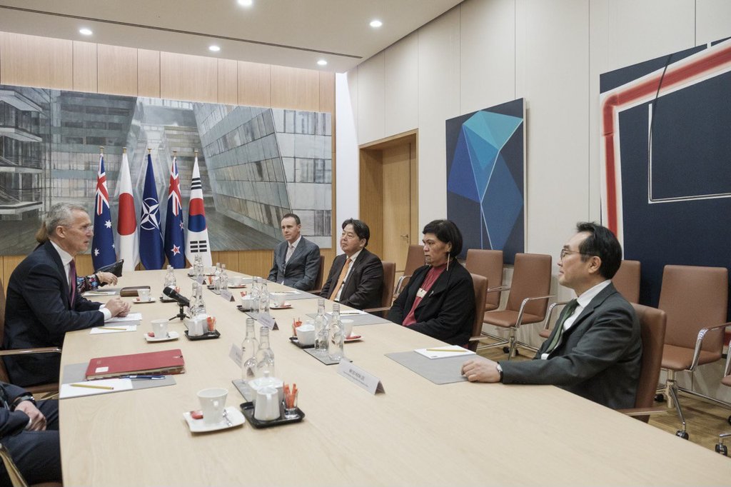 South Korea's Second Vice Foreign Minister Lee Do-hoon (R) attends foreign ministerial talks between North Atlantic Treaty Organization (NATO) allies and their partners in Brussels, Belgium, on April 5, 2023, in this photo provided by South Korea's foreign ministry. (PHOTO NOT FOR SALE) (Yonhap)