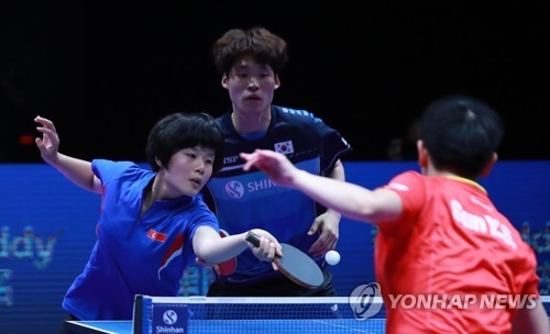 لاعب تنس طاولة كوري جنوبي ينال لقب "تأريخي" مع شريكته الكورية الشمالية - 3
