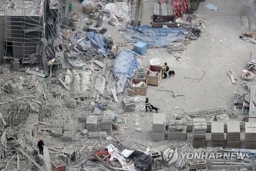 (جديد) العثور على شخص واحد في موقع انهيار المبنى السكني في مدينة كوانغجو - 2
