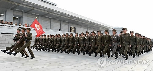 North Korean soldiers march in a parade at the plaza in front of the Kumsusan Palace of the Sun in Pyongyang on April 10, 2017, as they attend a ceremony to mark the April 15 birth anniversary of late founder Kim Il-sung, in this photo provided by the Korean Central News Agency. (For Use Only in the Republic of Korea. No Redistribution) (Yonhap)
