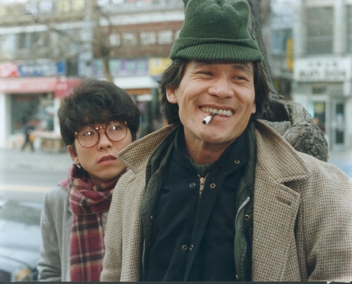 This still photo provided by the Korea Film Archive shows actor Ahn Sung-ki (R) as Min-woo in "Whale Hunting" (1984). (Yonhap)
