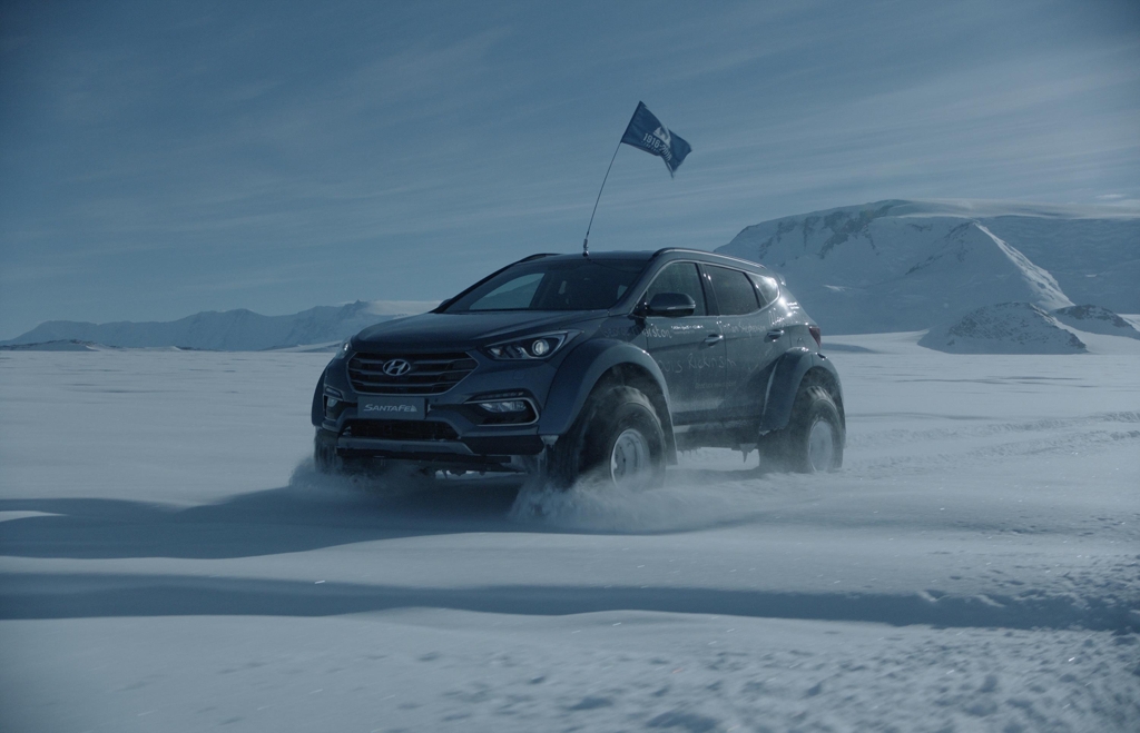 A Hyundai Santa Fe drives through the snow on journey to traverse the Antarctic in December. (Photo courtesy of Hyundai Motor)