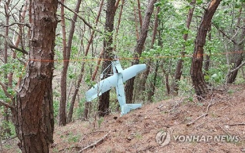A photo, provided by South Korea's military, shows a North Korean drone found on a mountain in Inje, Gangwon Province, on June 9, 2017. (Yonhap)
