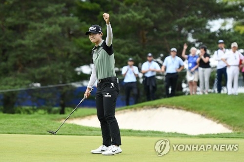 In this Getty Images photo, Park Sung-hyun of South Korea reacts after making a birdie putt on the second playoff hole to win the KPMG Women's PGA Championship at Kemper Lakes Golf Course in Kildeer, Illinois, on July 1, 2018. (Yonhap)