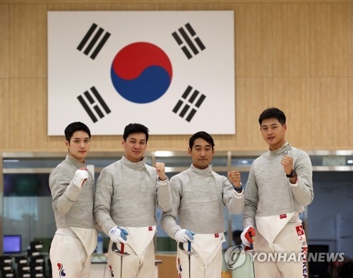 From left: South Korean sabre fencers Kim Jun-ho, Gu Bon-gil, Kim Jung-hwan and Oh Sang-uk pose for photos during the media day event at the Jincheon National Training Center in Jincheon, 90 kilometers south of Seoul, on Aug. 6, 2018. (Yonhap)