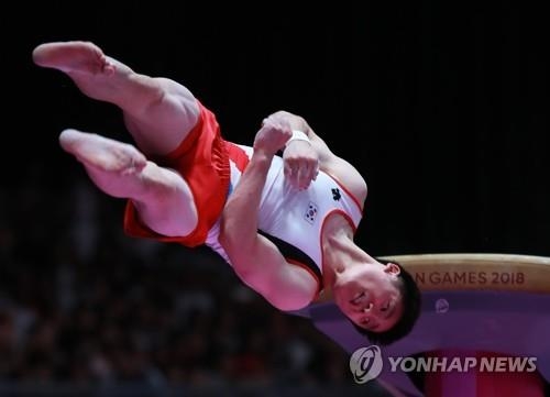 Gymnast Kim Han-sol wins gold in men's floor exercise