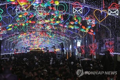 A street decked with lamps in the shape of sancheoneo (Yonhap)