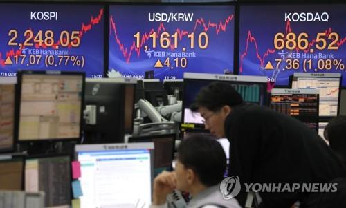 (LEAD) Seoul stocks hit 9-month high after Sino-U.S. trade deal