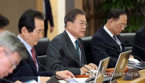 President Moon Jae-in (C) speaks during a Cabinet meeting at the main government complex in central Seoul on Jan. 21, 2020. (Yonhap)
