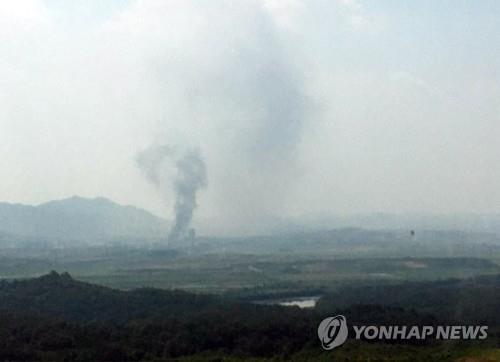 Smoke rises from North Korea's border town of Kaesong on June 16, 2020, as North Korea, according to the unification ministry, blew up the inter-Korean liaison office there in protest over South Korean activists' anti-regime leaflet campaign, in this photo provided by a Yonhap reader. (PHOTO NOT FOR SALE) (Yonhap) 