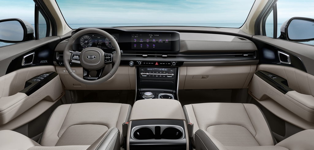 Kia unveils interior design of new Carnival minivan