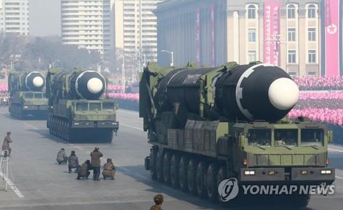 Hwasong-15 missiles on mobile launchers are displayed during a military parade at Kim Il-sung Square in Pyongyang on Feb. 8, 2018, in this photo released by the North's official Korean Central News Agency the next day. (For Use Only in the Republic of Korea. No Redistribution) (Yonhap)