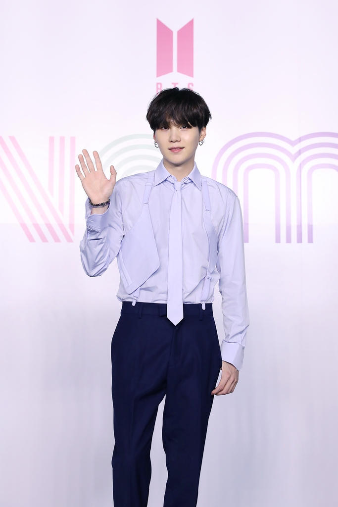 Suga of K-pop sensation BTS poses for photos during an online press conference for the new single "Dynamite" held in Seoul on Aug. 21, 2020, in this photo provided by Big Hit Entertainment. (PHOTO NOT FOR SALE) (Yonhap)