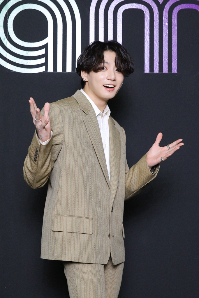 This photo, provided by Big Hit Entertainment on Sept. 2, 2020, shows member Junggook of K-pop sensation BTS posing for photos during an online press conference to celebrate the band's single "Dynamite" debuting at No. 1 on the Billboard Hot 100 chart. (PHOTO NOT FOR SALE) (Yonhap)
