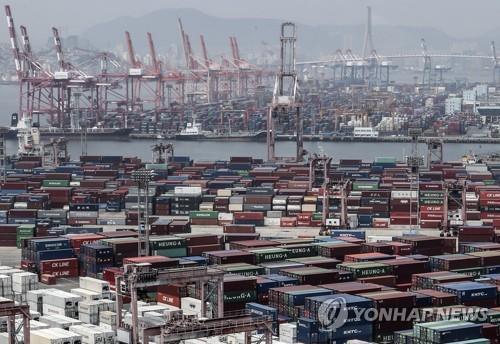 This file photo, taken June 4, 2020, shows stacks of import-export cargo containers at South Korea's largest seaport, located in Busan, 450 kilometers southeast of Seoul. (Yonhap)